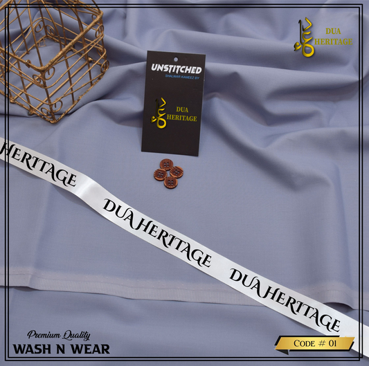 Dua Heritage fabric with a belt and packaging on a gray background