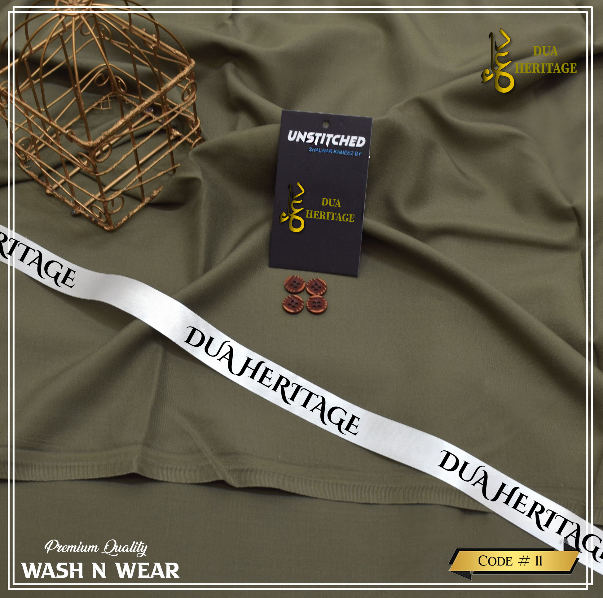 Dua Heritage fabric with packaging and accessories on a green fabric background